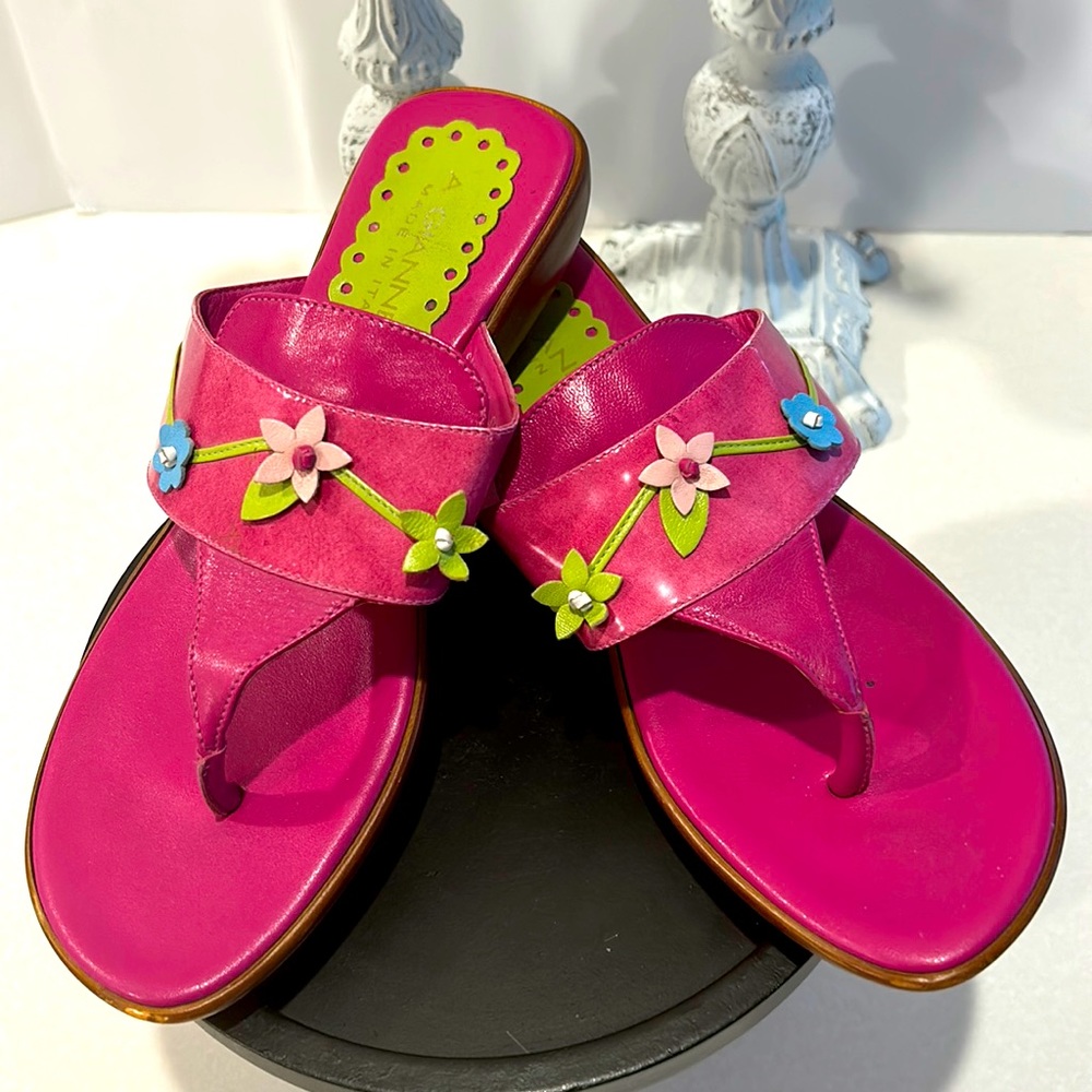 A. Giannetti made in Italy thong sandals with flower details.